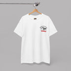 White t-shirt with a graphic Healey design on a hanger against a gray background