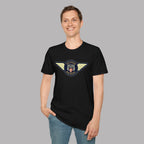 Man wearing a Austin Healey winged badge logo with navy and gold circular emblem, heraldic shield, and cream wings on a black t-shirt flat on gray background