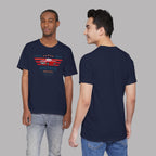 Two people wearing navy blue t-shirts with a classic car graphic design on a gray background
