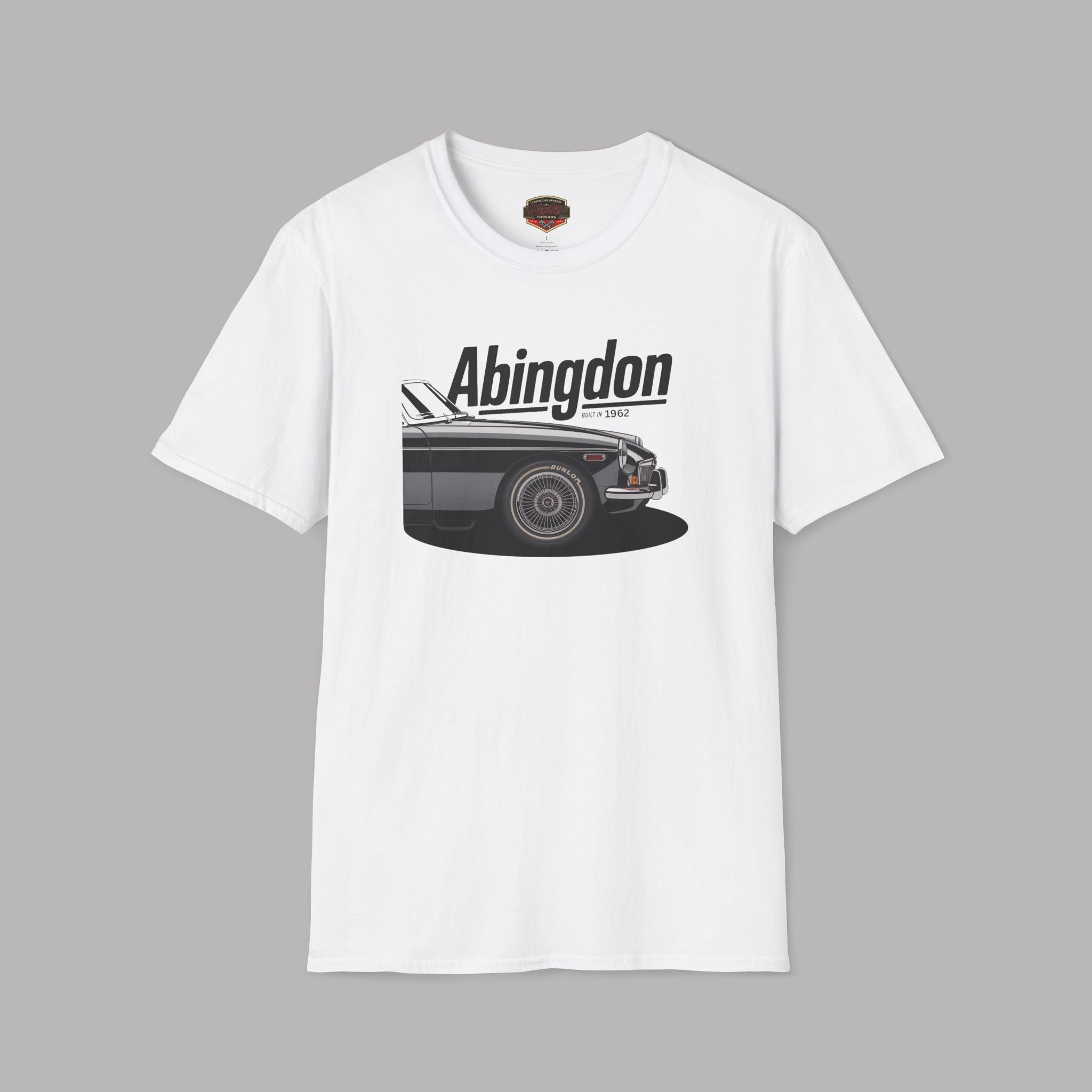 White t-shirt with a graphic of a classic car and 'Abingdon' text on a gray background