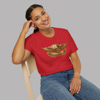 Woman wearing a red t-shirt with a gold Healey emblem on a gray background