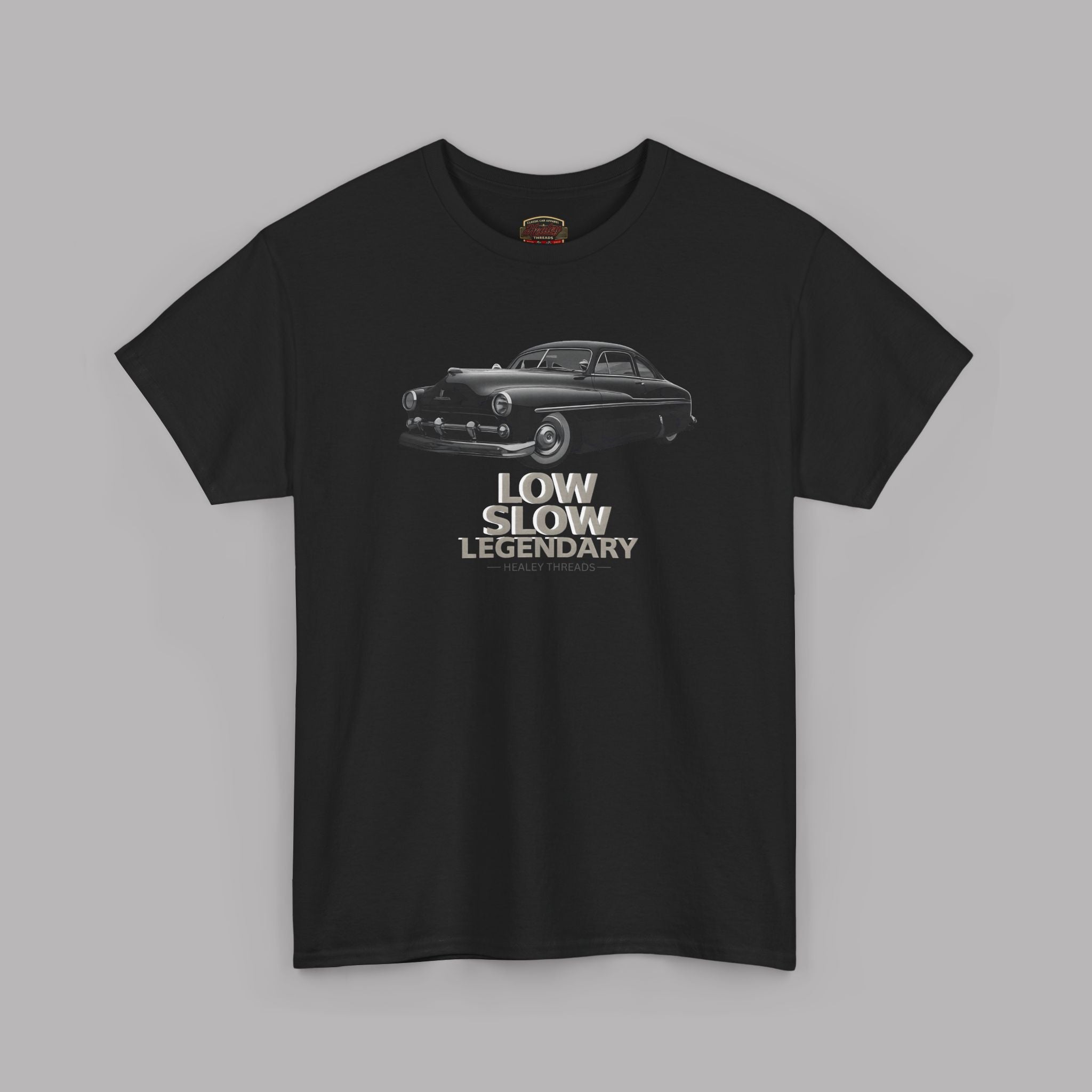 Black t-shirt with car graphic and 'Low Slow Legendary' text on a gray background