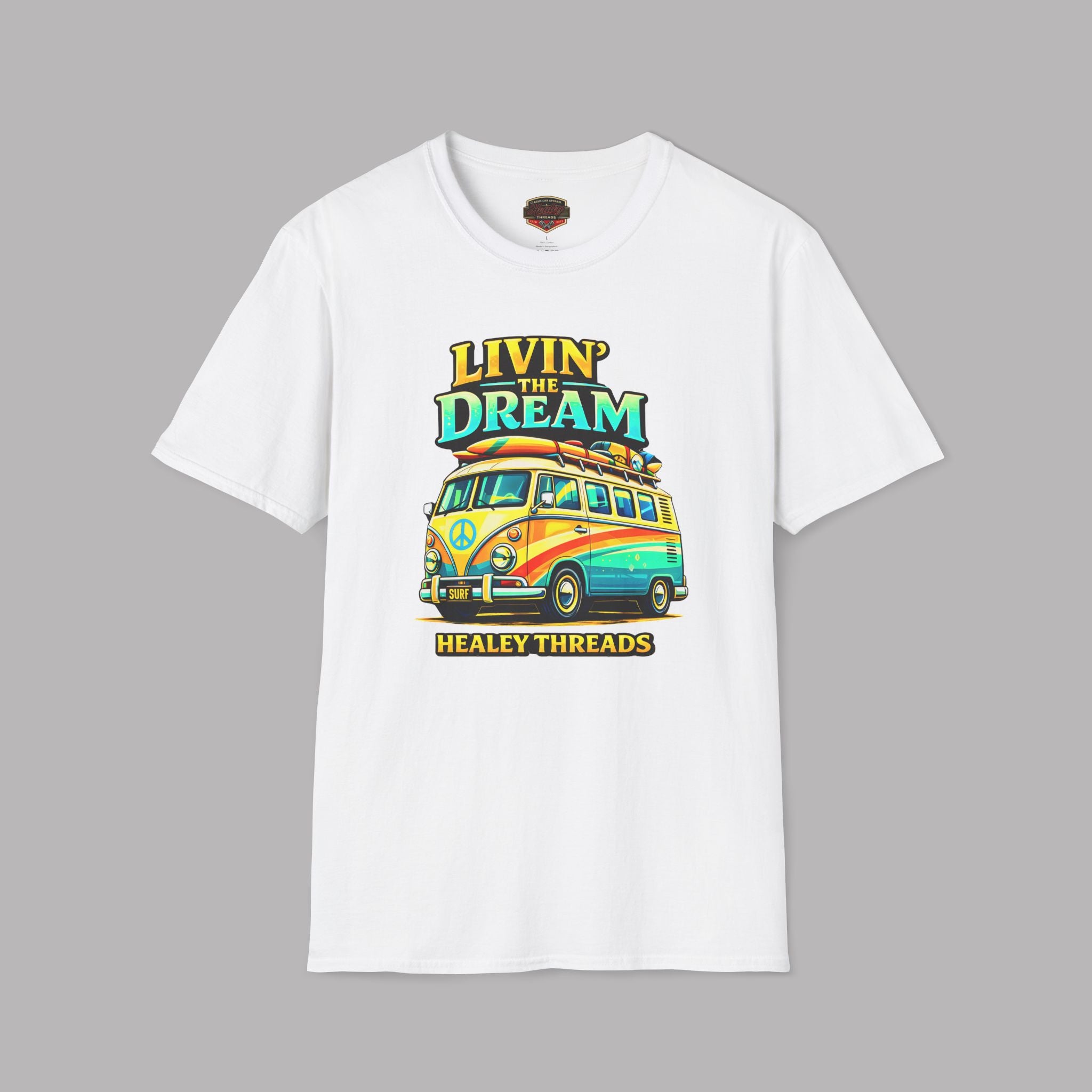 White t-shirt with colorful graphic and text on a gray background