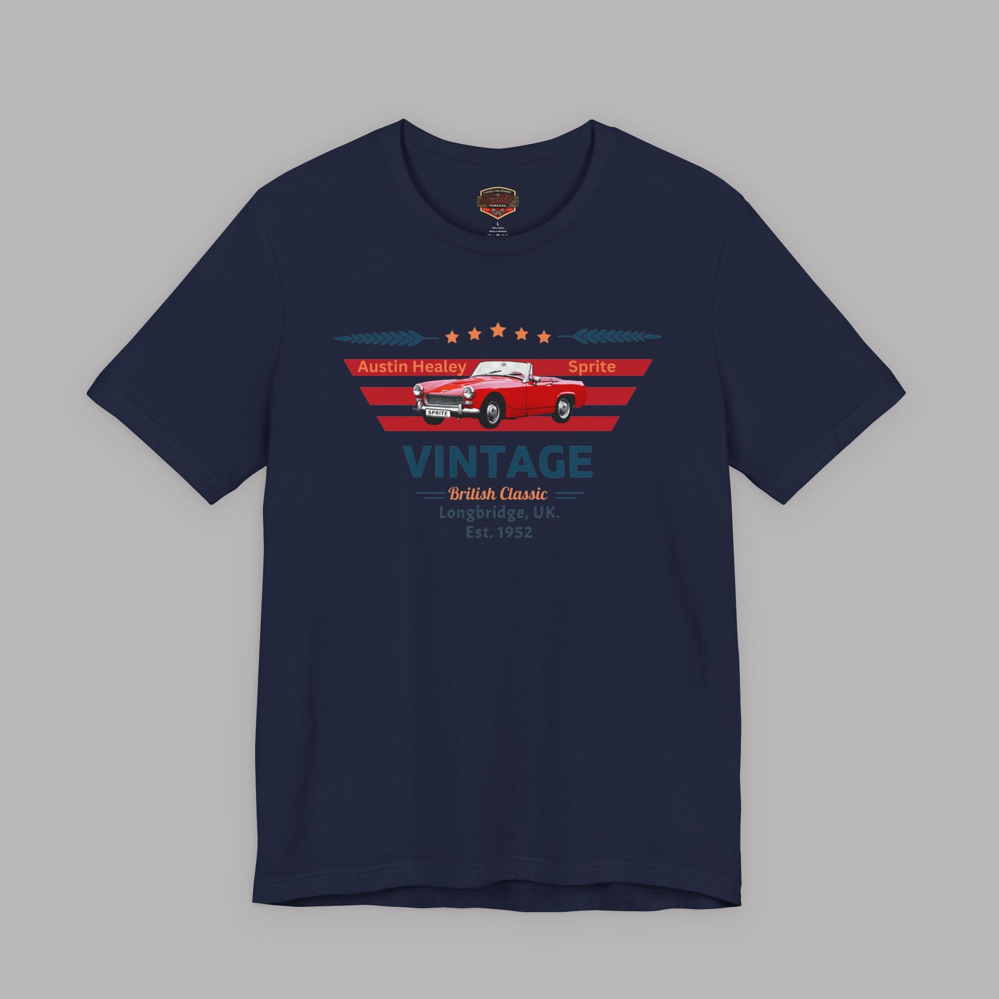 Navy blue t-shirt with a red classic car graphic and text on a gray background
