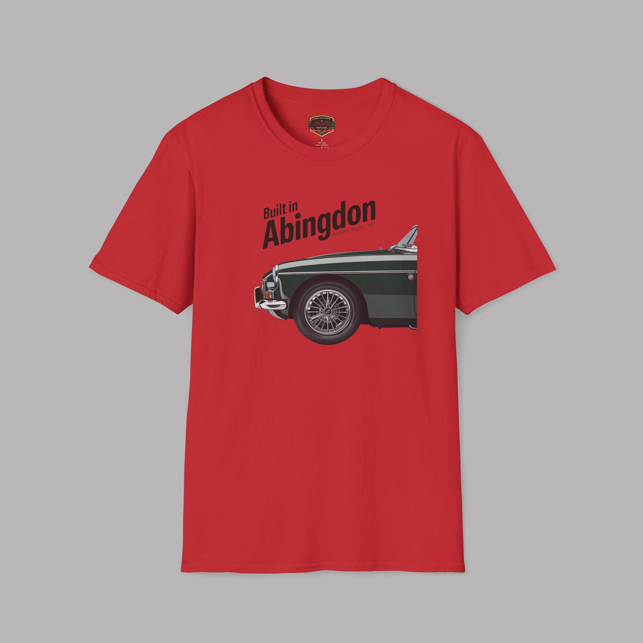 Red t-shirt with a graphic of a classic car and 'Built in Abingdon' text on a gray background