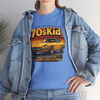 Person wearing a blue t-shirt with a graphic design and text, paired with a denim jacket.