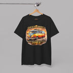Black t-shirt with a 1962 vintage van graphic and text on a hanger against a gray background