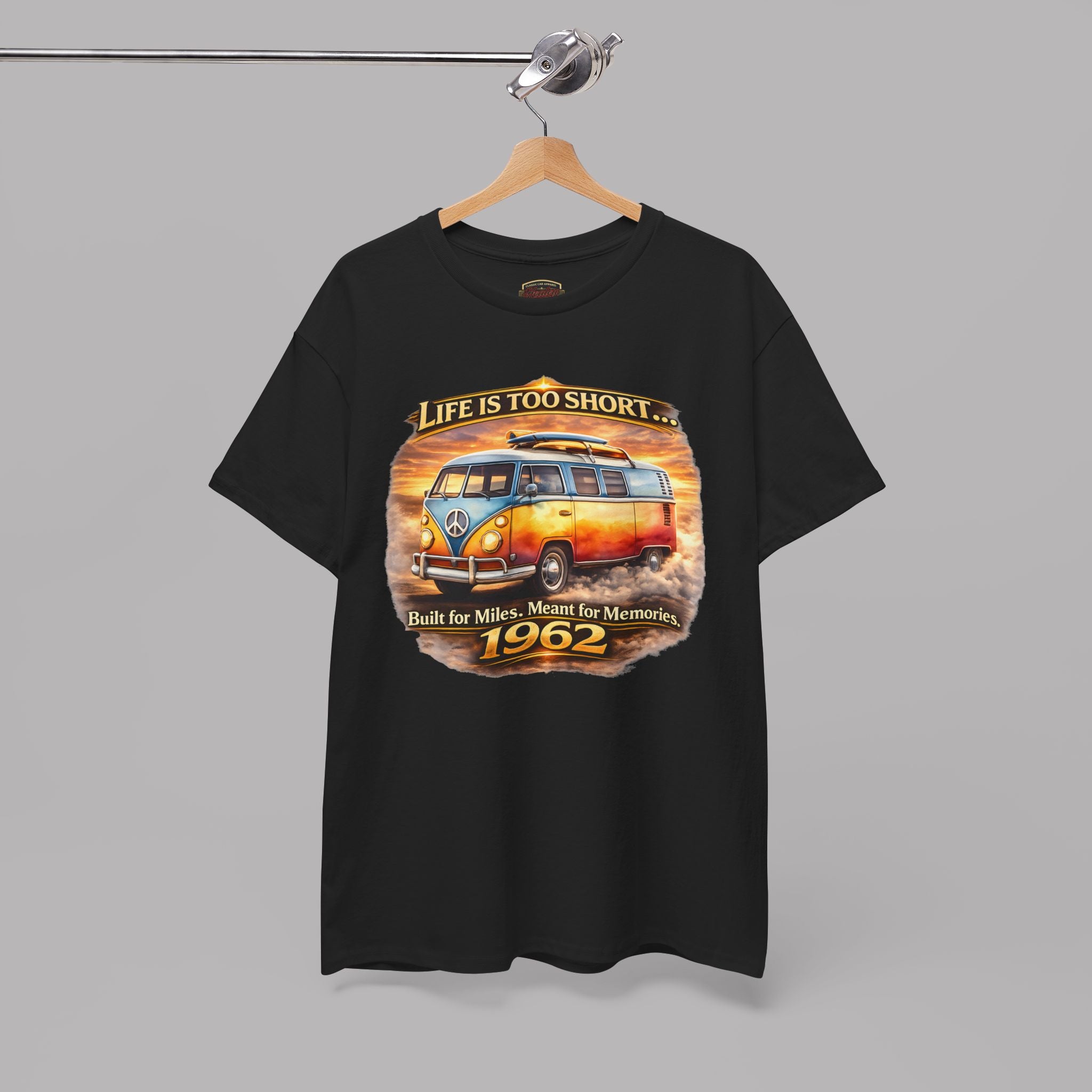Black t-shirt with a 1962 vintage van graphic and text on a hanger against a gray background