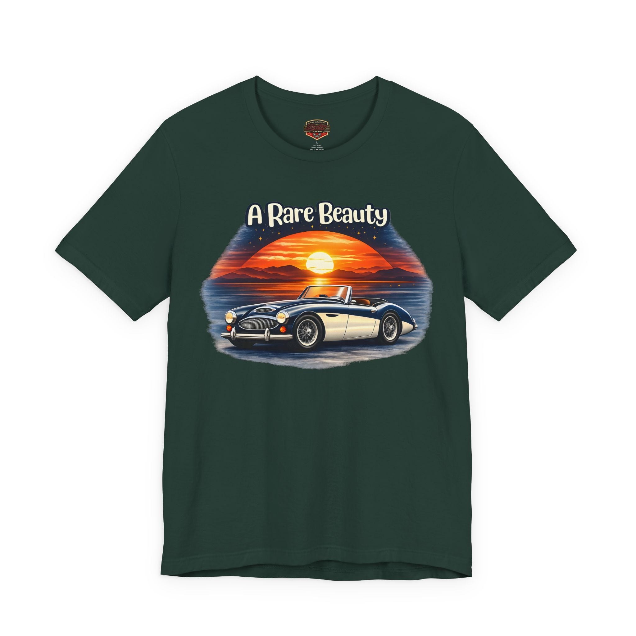 Forest green t-shirt with a vintage Healey car graphic and 'A Rare Beauty' text on a white background