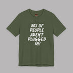 An military green short-sleeve t-shirt with white text on the front reading '80% OF PEOPLE AREN'T PLUGGED IN!' displayed against a solid gray background.