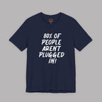 Navy blue t-shirt with white text "80% of People Aren't Plugged In" on a gray background