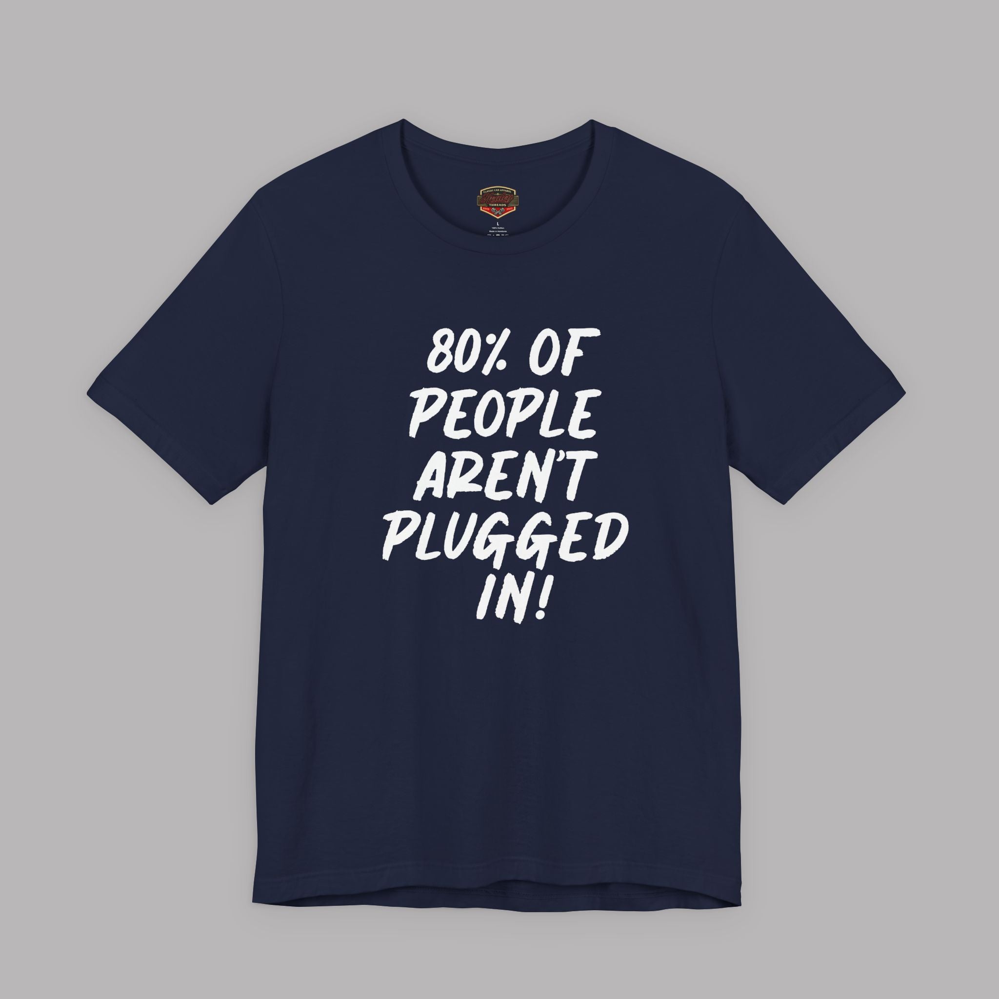 Navy blue t-shirt with white text "80% of People Aren't Plugged In" on a gray background