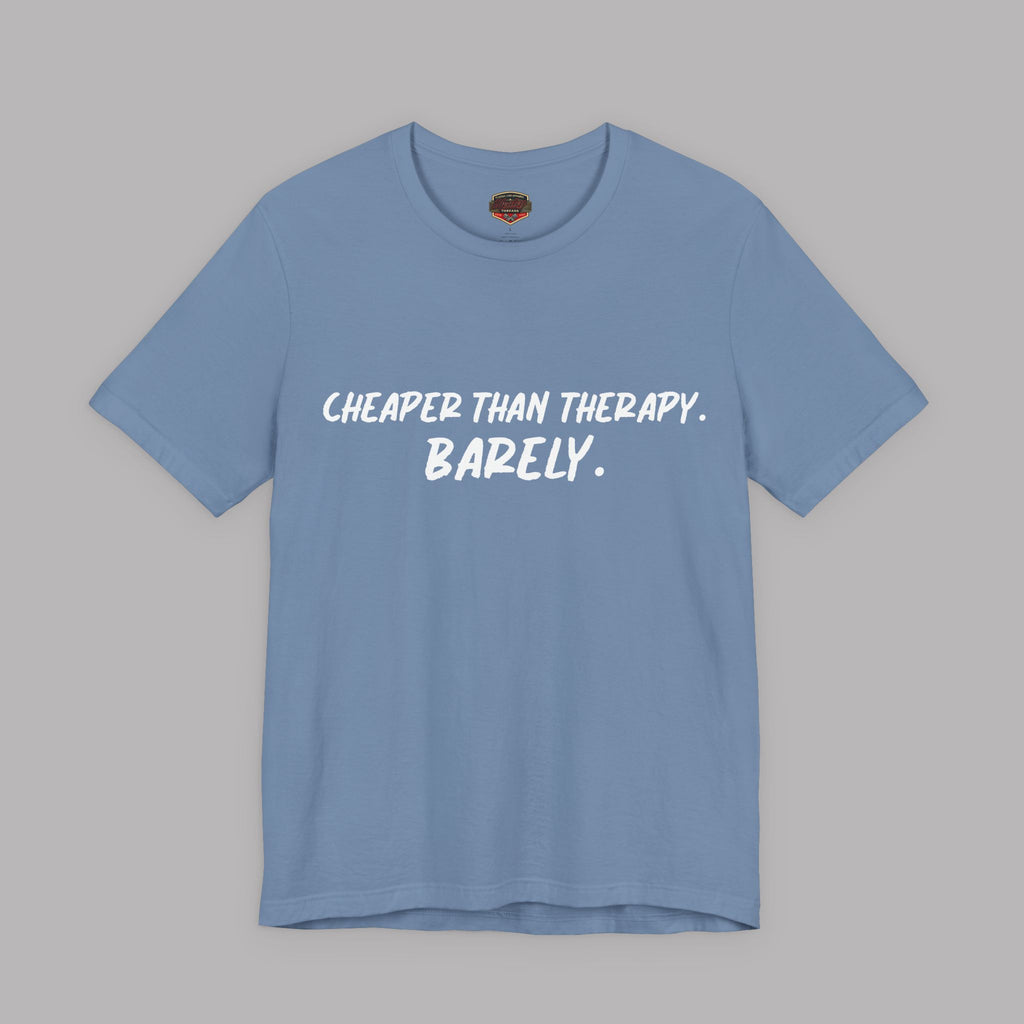 Steel blue  t-shirt with white text "Cheaper than therapy. Barely." on a gray background