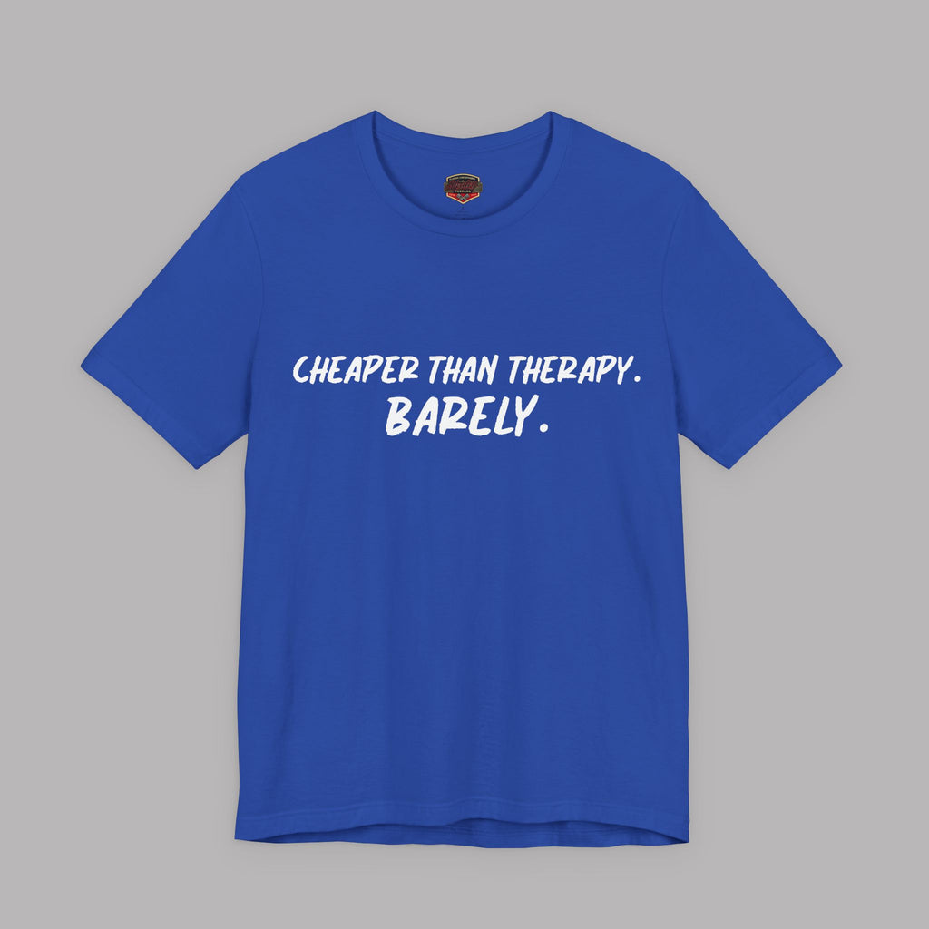 True blue t-shirt with white text "Cheaper than therapy. Barely." on a gray background