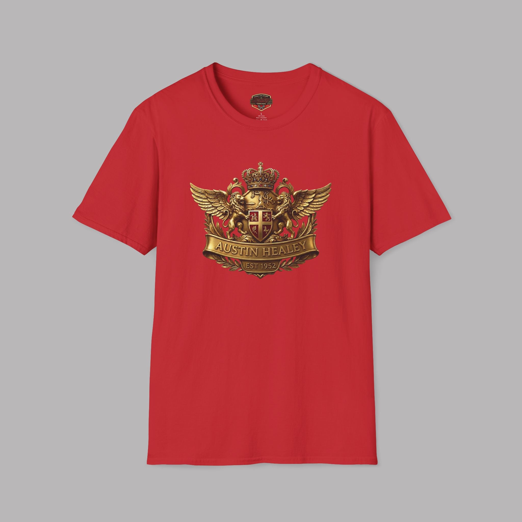 Red t-shirt with a gold emblem on a gray background