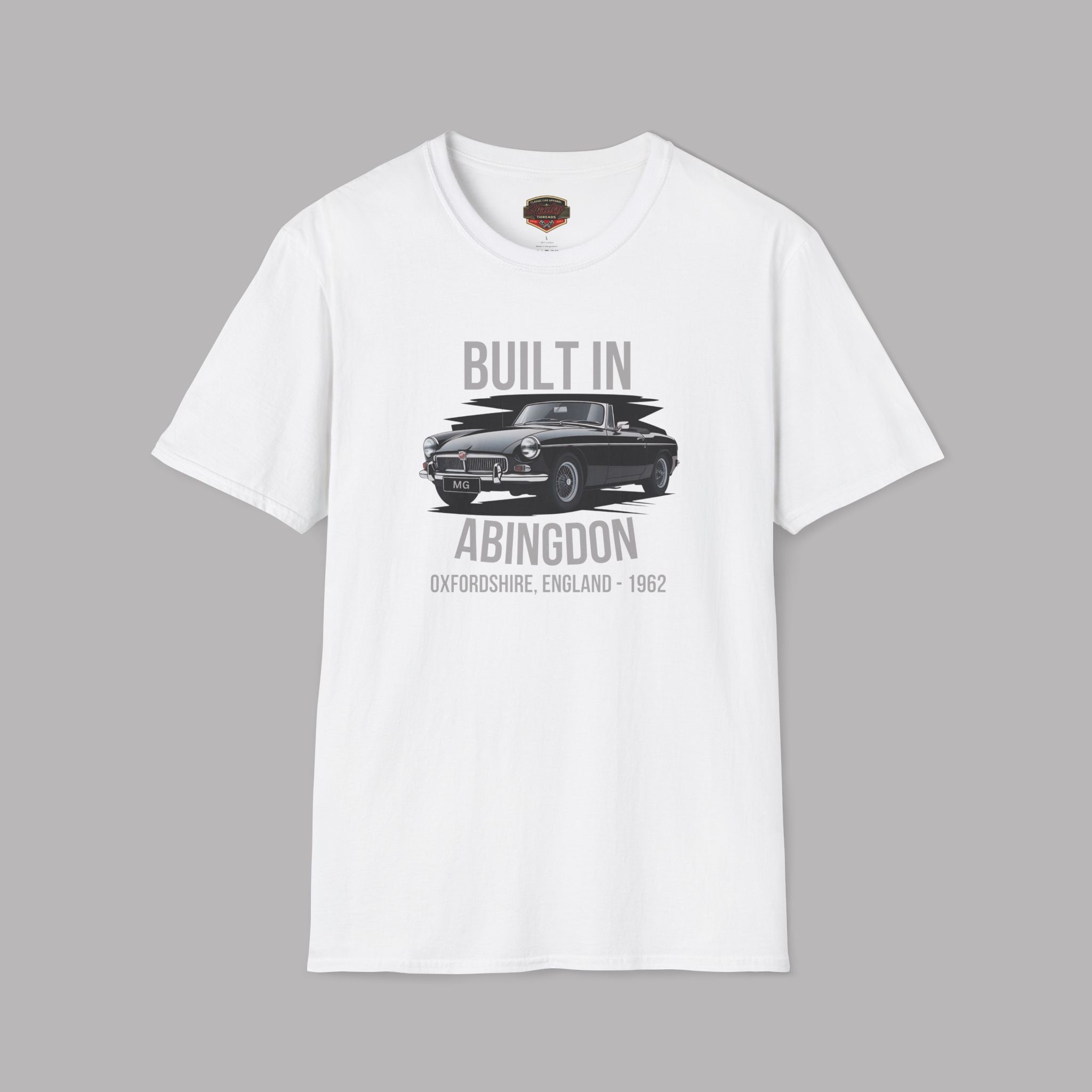 White t-shirt with MGB car graphic and text on a gray background