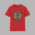 A red short-sleeve crewneck t-shirt featuring a circular 'Abingdon Motor Works' crest graphic printed on the chest, displayed against a solid gray background.