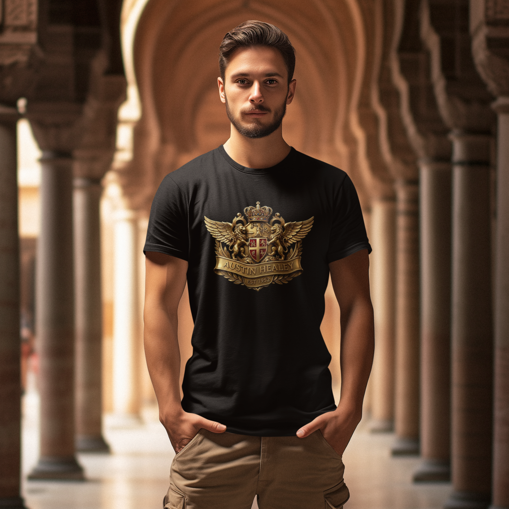 Man wearing a black t-shirt with a gold emblem in an architectural setting